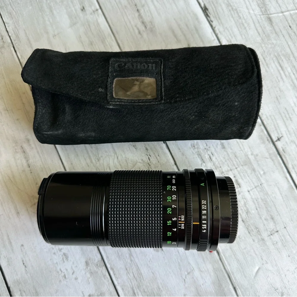 VINTAGE PREOWNED CANON LENS FD 200 MM 1:4 BLACK LENS WITH CAP AND CASE